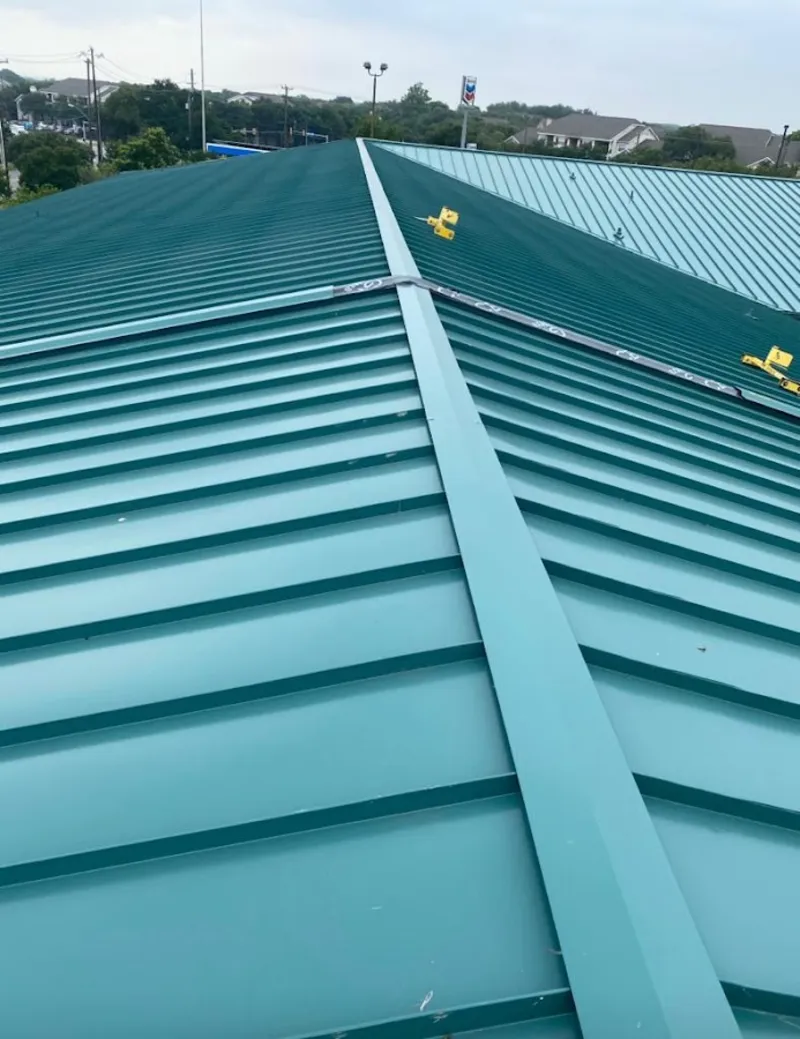 Green commercial metal roof ridge and valley for Metal Roof Repair in DeSoto