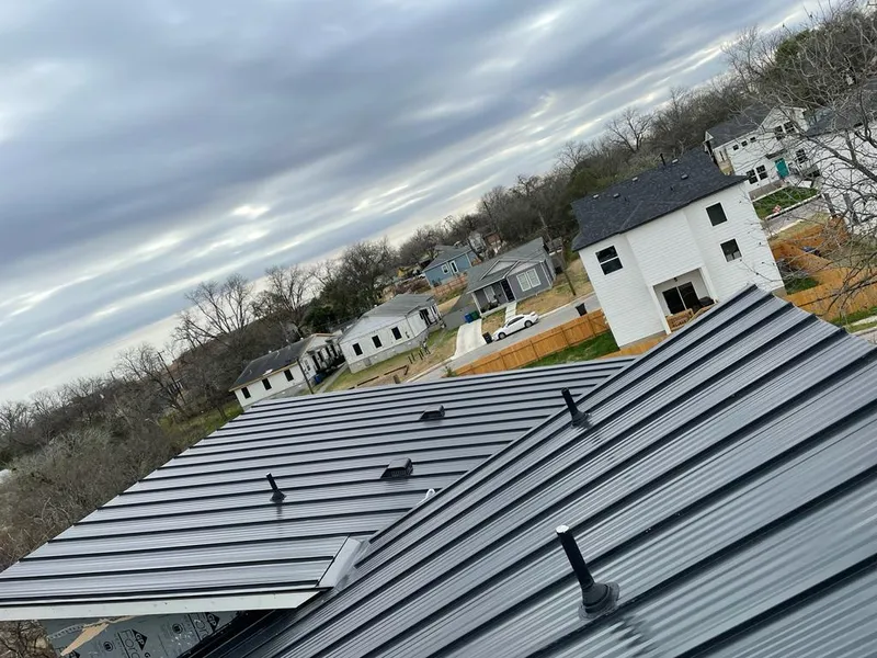 Standing seam metal roof panels with vents for Skylight Repair in DeSoto